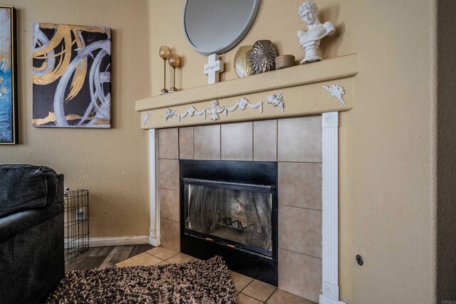 3035 Cat Tail Ct, Hemet, CA 92545 - detailed view of a tiled fireplace and baseboards