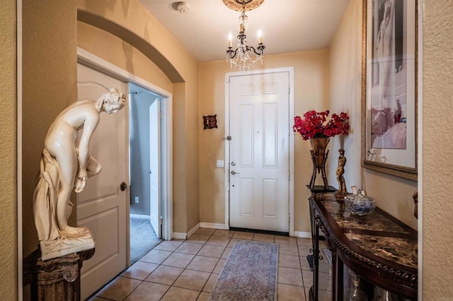 3035 Cat Tail Ct, Hemet, CA 92545 - foyer featuring light tile patterned floors and a chandelier