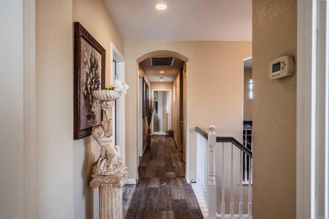 3035 Cat Tail Ct, Hemet, CA 92545 - corridor with arched walkways, dark wood-type flooring, and recessed lighting