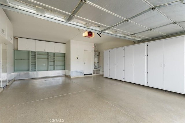 28399 Long Meadow Dr, Menifee, CA 92584 - garage with water heater and a garage door opener