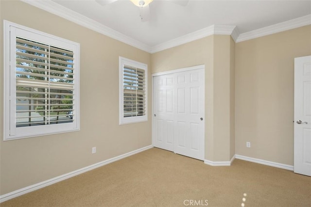 28399 Long Meadow Dr, Menifee, CA 92584 - unfurnished bedroom featuring carpet floors, crown molding, a closet, and ceiling fan