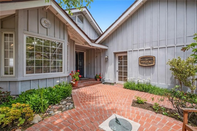 2005 Yacht Resolute, Newport Beach, CA 92660 - property entrance with board and batten siding and a patio