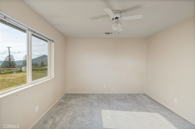 5664-5668 Clouds, Mariposa, CA 95338 - empty room featuring light colored carpet, a ceiling fan, and baseboards