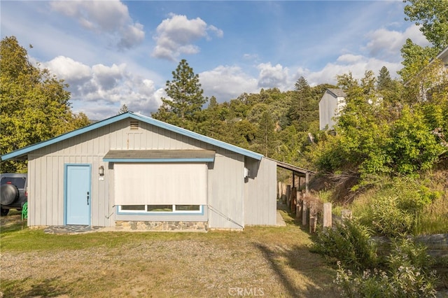 5664-5668 Clouds, Mariposa, CA 95338 - back of house with a lawn and oil tank