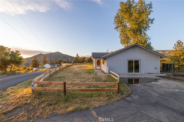 5664-5668 Clouds, Mariposa, CA 95338 - view of front of home featuring fence and a mountain view