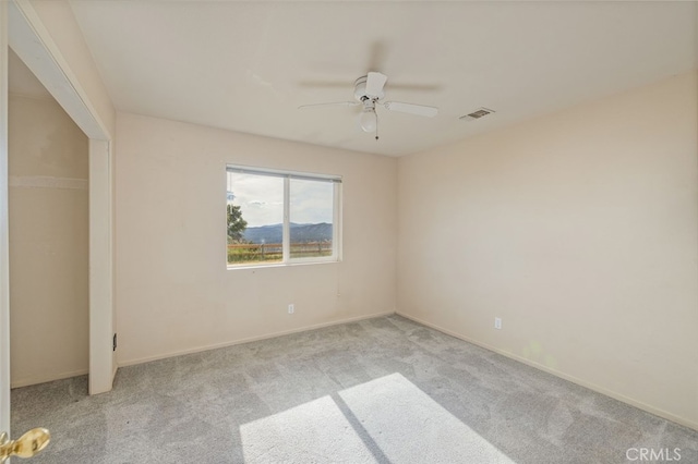 5664-5668 Clouds, Mariposa, CA 95338 - spare room with light carpet, ceiling fan, and baseboards