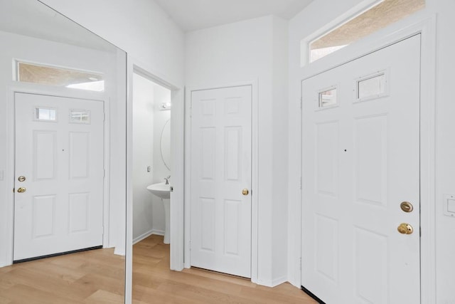 8580 New Salem St Unit 7, San Diego, CA 92126 - foyer featuring light wood-style floors and baseboards