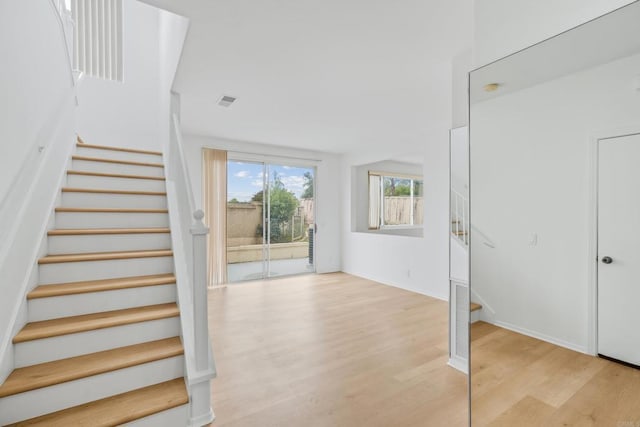 8580 New Salem St Unit 7, San Diego, CA 92126 - stairs with wood finished floors and baseboards