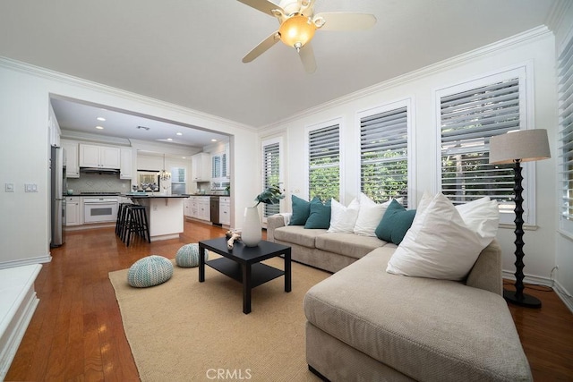 26 Upland, Irvine, CA 92602 - living room featuring ornamental molding, wood finished floors, a ceiling fan, and baseboards