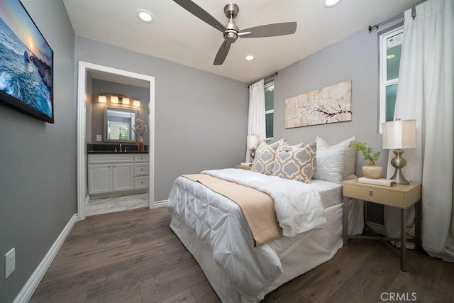 26 Upland, Irvine, CA 92602 - bedroom featuring dark wood-type flooring, recessed lighting, baseboards, multiple windows, and ensuite bathroom
