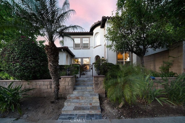 26 Upland, Irvine, CA 92602 - mediterranean / spanish-style home with stucco siding and a tiled roof