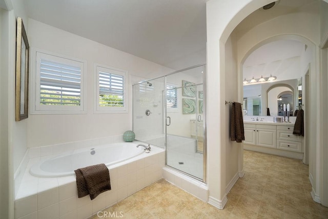 26 Upland, Irvine, CA 92602 - bathroom featuring a bath, vanity, a shower stall, and tile patterned flooring