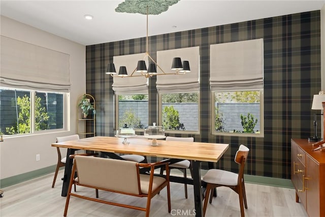 920 Bunkhouse Dr, Rancho Mission Viejo, CA 92694 - dining space with wallpapered walls and light wood finished floors