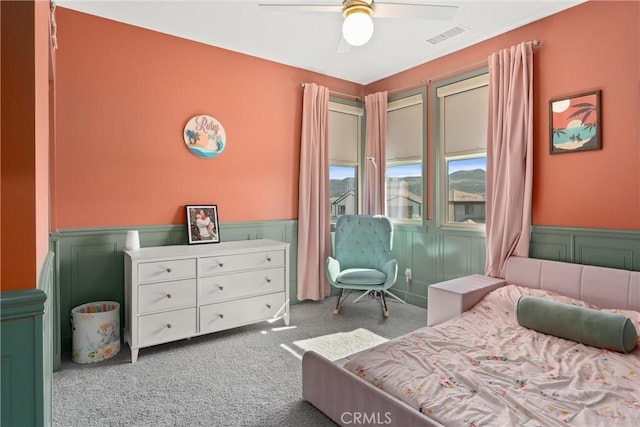 920 Bunkhouse Dr, Rancho Mission Viejo, CA 92694 - bedroom with carpet, wainscoting, and ceiling fan