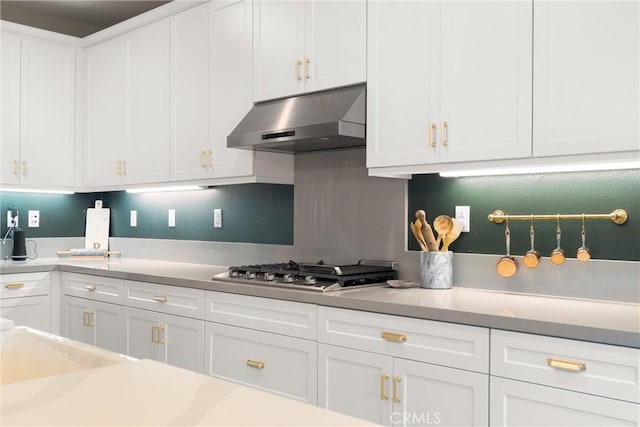 920 Bunkhouse Dr, Rancho Mission Viejo, CA 92694 - kitchen featuring exhaust hood, white cabinets, and stainless steel gas stovetop