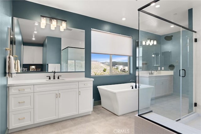 920 Bunkhouse Dr, Rancho Mission Viejo, CA 92694 - full bath with a stall shower, vanity, a soaking tub, and recessed lighting
