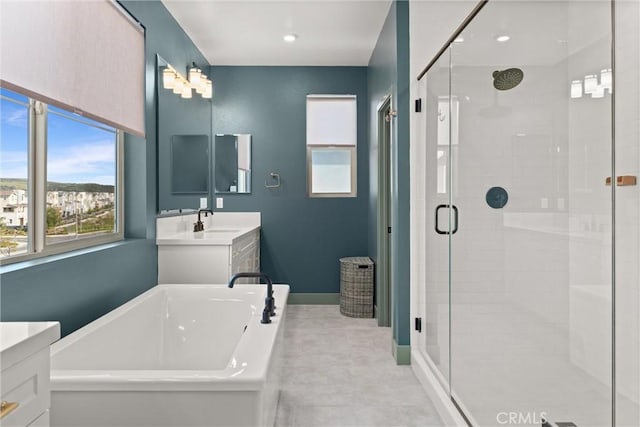 920 Bunkhouse Dr, Rancho Mission Viejo, CA 92694 - full bath featuring a freestanding bath, plenty of natural light, and vanity