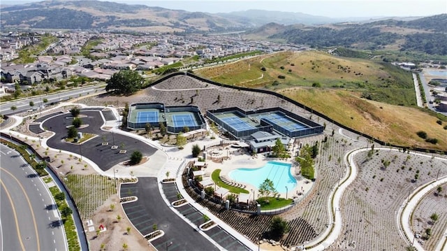 920 Bunkhouse Dr, Rancho Mission Viejo, CA 92694 - aerial view of property and surrounding area with a pool area and a mountain backdrop