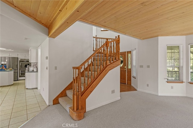 50711 Rd 426, Oakhurst, CA 93644 - stairway with wooden ceiling, baseboards, and carpet floors