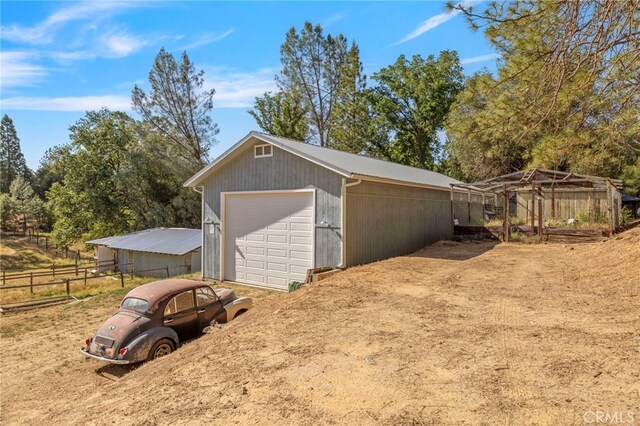 50711 Rd 426, Oakhurst, CA 93644 - detached garage featuring dirt driveway