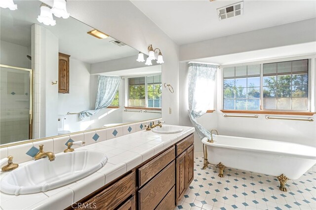 50711 Rd 426, Oakhurst, CA 93644 - bathroom with double vanity, a soaking tub, and a shower stall