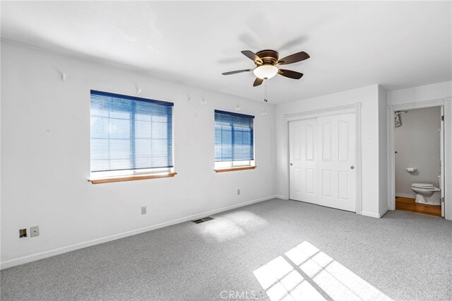 50711 Rd 426, Oakhurst, CA 93644 - unfurnished bedroom with light carpet, a closet, and ceiling fan