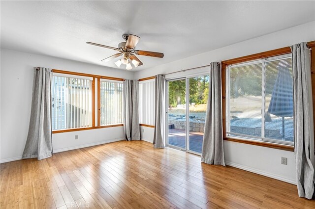 50711 Rd 426, Oakhurst, CA 93644 - unfurnished room with ceiling fan and wood finished floors