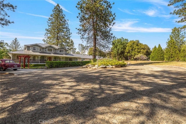 50711 Rd 426, Oakhurst, CA 93644 - view of front of home with a metal roof