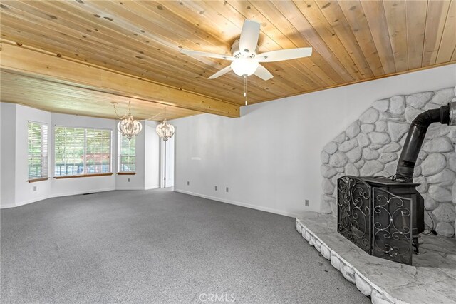 50711 Rd 426, Oakhurst, CA 93644 - unfurnished living room with wooden ceiling, a wood stove, carpet flooring, ceiling fan, and a chandelier