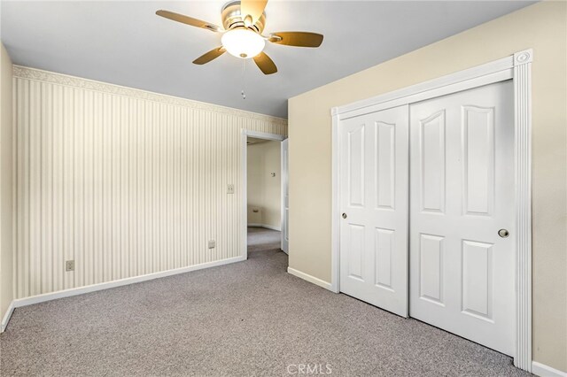 50711 Rd 426, Oakhurst, CA 93644 - unfurnished bedroom featuring carpet flooring, a closet, and a ceiling fan