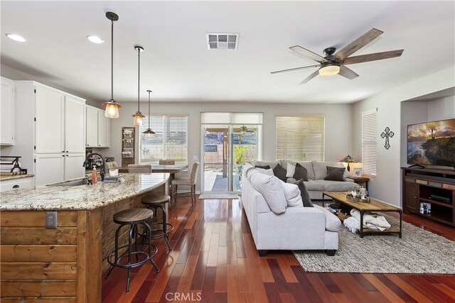 28759 Eridanus Dr, Menifee, CA 92586 - living room with a ceiling fan, dark wood-style flooring, and recessed lighting