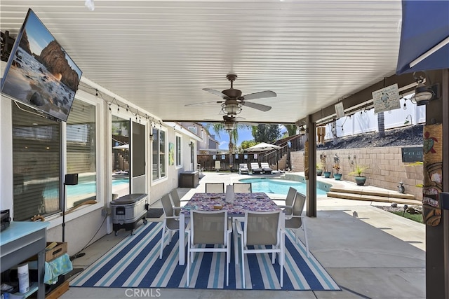 28759 Eridanus Dr, Menifee, CA 92586 - view of patio featuring a fenced backyard, outdoor dining space, and a ceiling fan