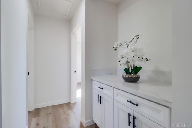 1215 Grand Ave, Spring Valley, CA 91977 - bathroom featuring wood finished floors, vanity, and baseboards
