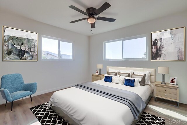 1215 Grand Ave, Spring Valley, CA 91977 - bedroom with wood finished floors, ceiling fan, and baseboards