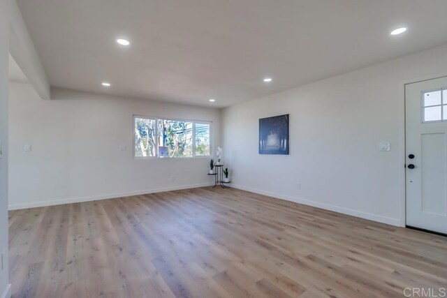 1215 Grand Ave, Spring Valley, CA 91977 - entryway with light wood-style flooring, recessed lighting, plenty of natural light, and baseboards