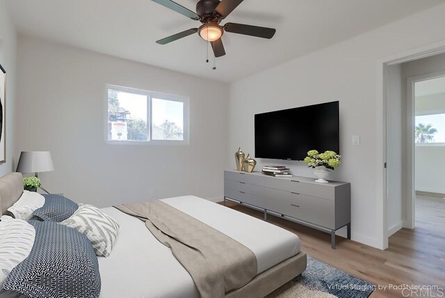 1215 Grand Ave, Spring Valley, CA 91977 - bedroom featuring light wood finished floors, ceiling fan, and baseboards