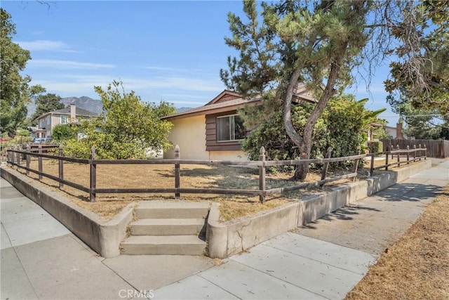 1487 Asbury Dr, Pasadena, CA 91104 - view of front facade featuring stucco siding