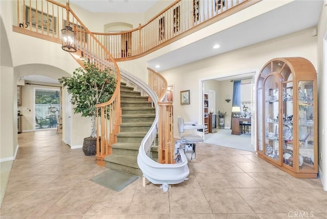 43376 Terra Ct, Temecula, CA 92592 - tiled entryway with a towering ceiling, stairs, recessed lighting, and baseboards