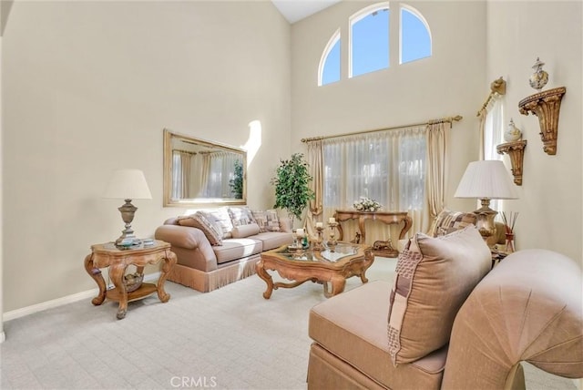 43376 Terra Ct, Temecula, CA 92592 - carpeted living room featuring a towering ceiling and baseboards