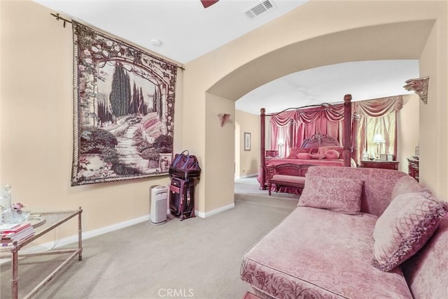 43376 Terra Ct, Temecula, CA 92592 - living room with arched walkways, carpet, baseboards, and a ceiling fan