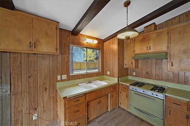 951 Snowbird Rd, Wrightwood, CA 92397 - kitchen with white range with gas cooktop, a sink, under cabinet range hood, beam ceiling, and wooden walls