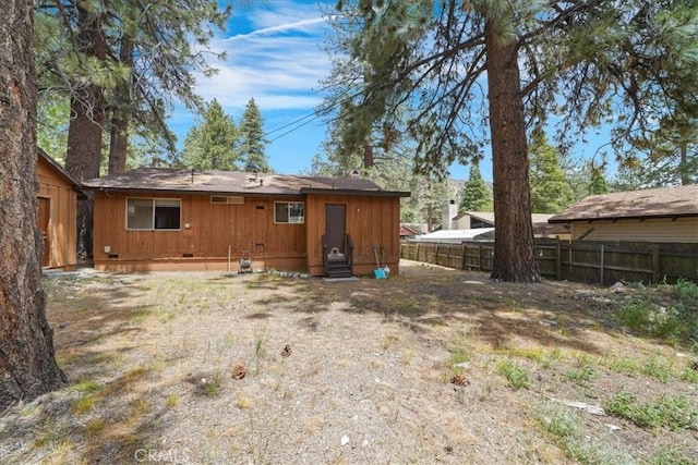 951 Snowbird Rd, Wrightwood, CA 92397 - back of property with entry steps, crawl space, and board and batten siding