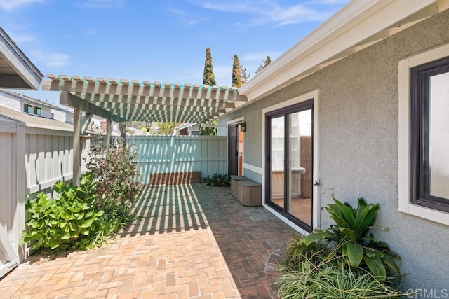 view of patio featuring a fenced backyard and a pergola