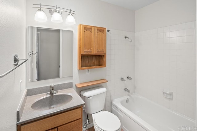 full bath with toilet, bathtub / shower combination, and vanity