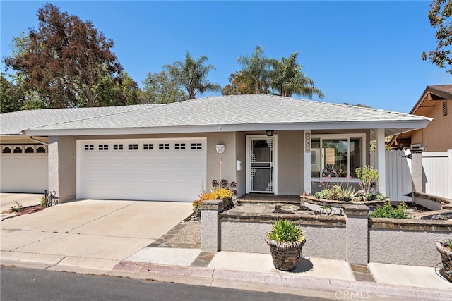 26455 Bay Tree Rd, San Juan Capistrano, CA 92675 - ranch-style house with concrete driveway, a garage, stucco siding, and fence