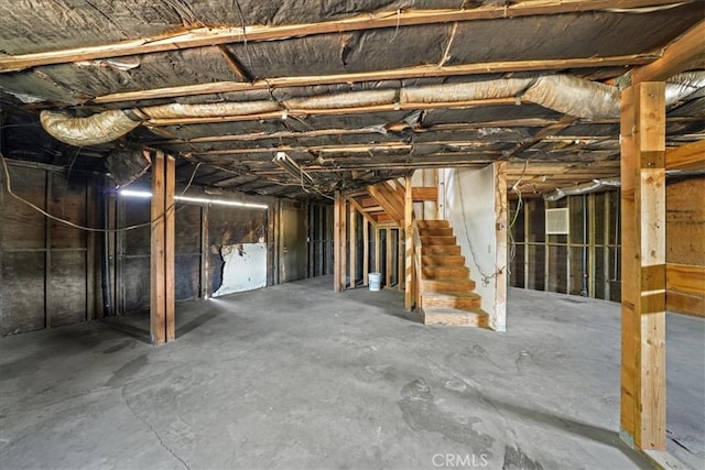 unfinished basement with stairs
