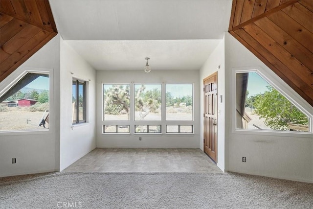 unfurnished sunroom featuring plenty of natural light