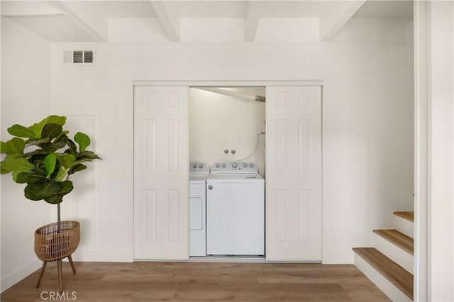 417 Delle Dr, Crestline, CA 92325 - laundry room featuring washer and dryer and wood finished floors
