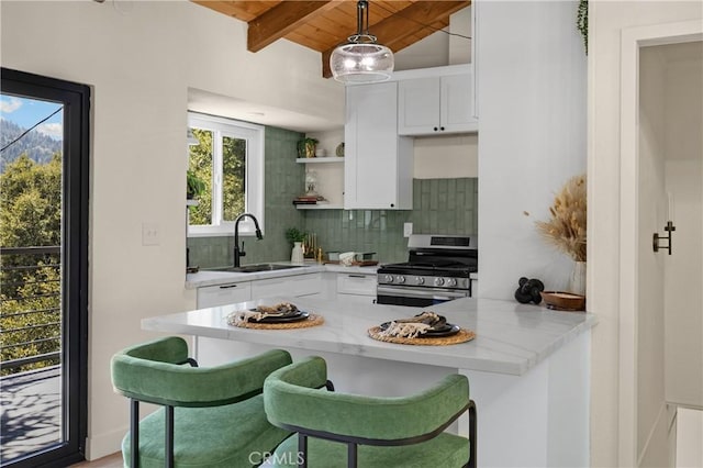 417 Delle Dr, Crestline, CA 92325 - kitchen with gas stove, wood ceiling with exposed beams, a sink, open shelves, and tasteful backsplash