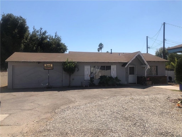 8852 Greenwood Ave, San Gabriel, CA 91775 - ranch-style home with a garage, stucco siding, and asphalt driveway